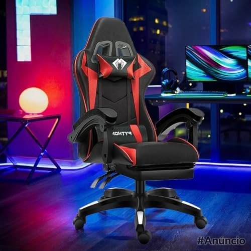Cadeira gamer ergonômica na cor preta com detalhes em vermelho, equipada com almofadas de apoio e suporte retrátil para os pés, posicionada em um ambiente com iluminação LED colorida.