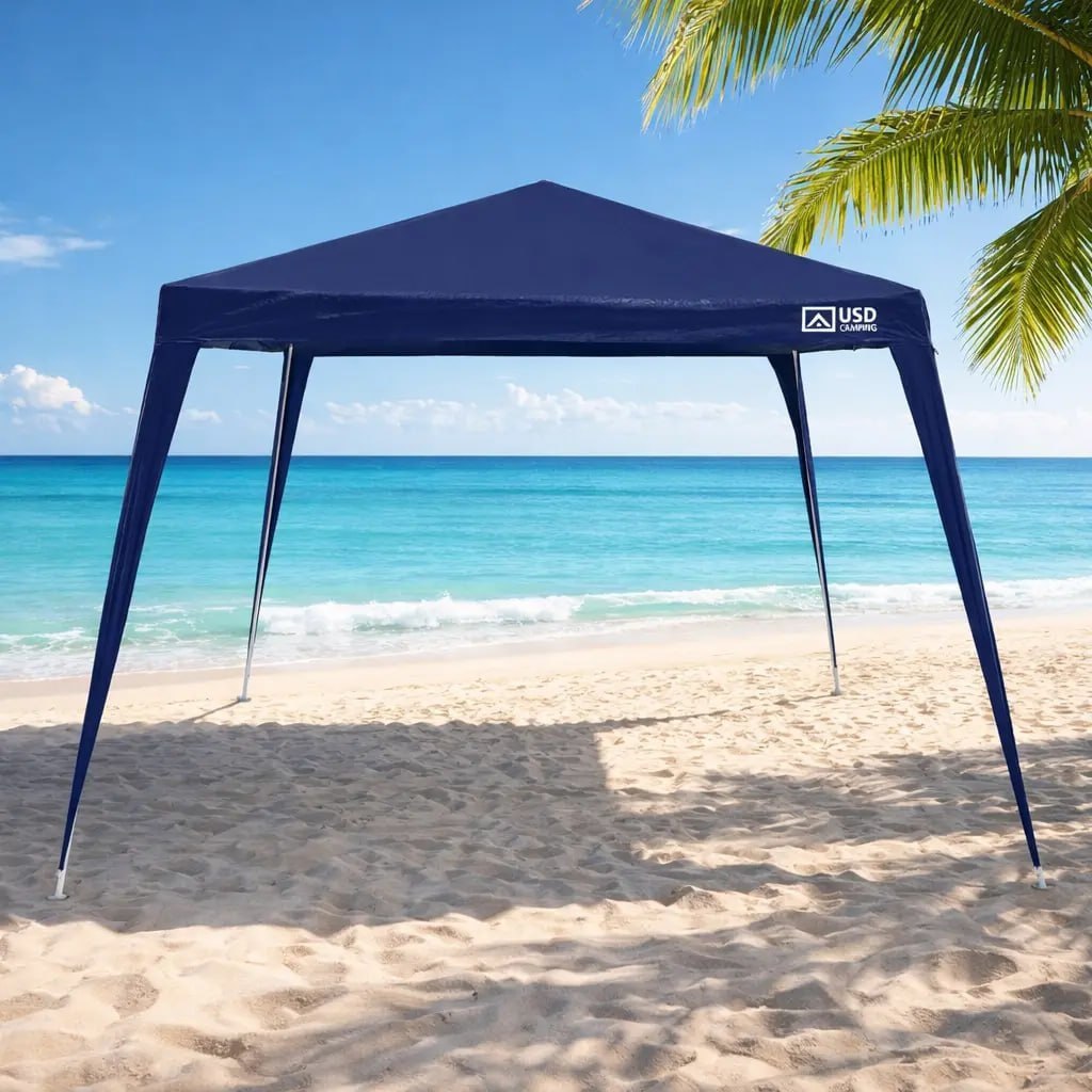 Barraca Gazebo 3x3m desmontável na cor azul com estrutura de aço, instalada em ambiente externo próximo ao mar