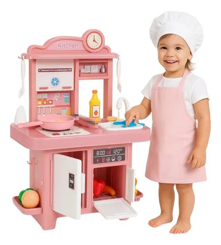 Cozinha infantil de brinquedo com luzes, som e compartimento para água, em tons de rosa e branco, com uma menina sorrindo ao lado